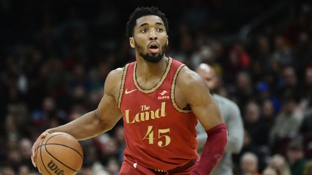 Feb 12, 2024; Cleveland, Ohio, USA; Cleveland Cavaliers guard Donovan Mitchell (45) brings the ball up court during the second half against the Philadelphia 76ers at Rocket Mortgage FieldHouse. Mandatory Credit: Ken Blaze-USA TODAY Sports